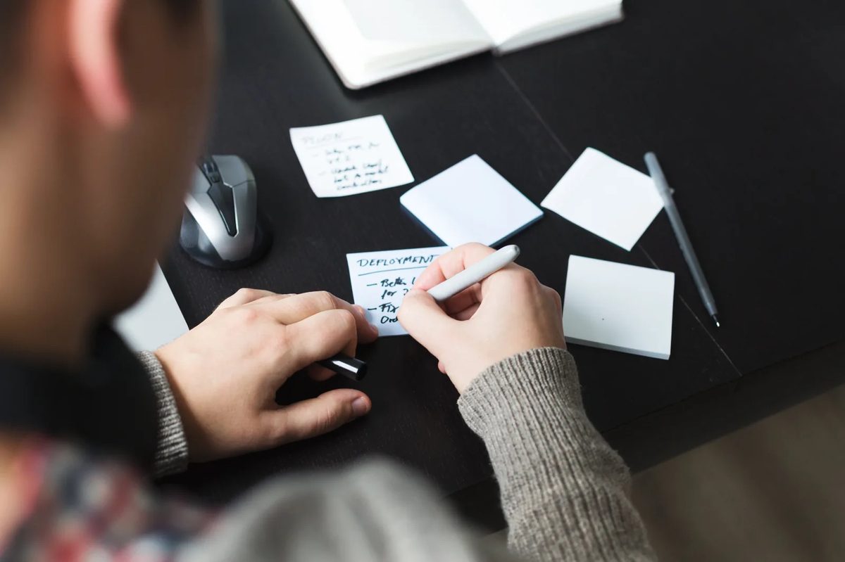 An engineer reviewing deployment notes